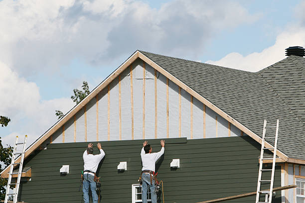 Professional Siding Contractor technician working in Madison, CT